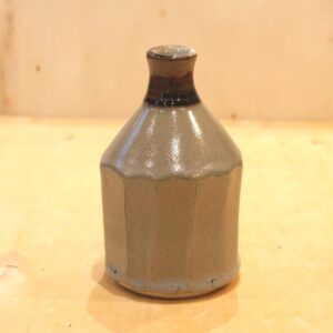 Small faceted bottle vase